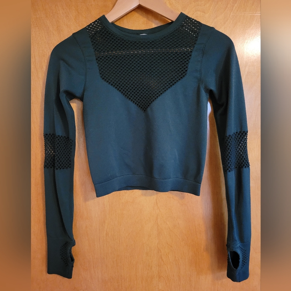 Dark teal long sleeve laser cut athletic crop top with thumb holes